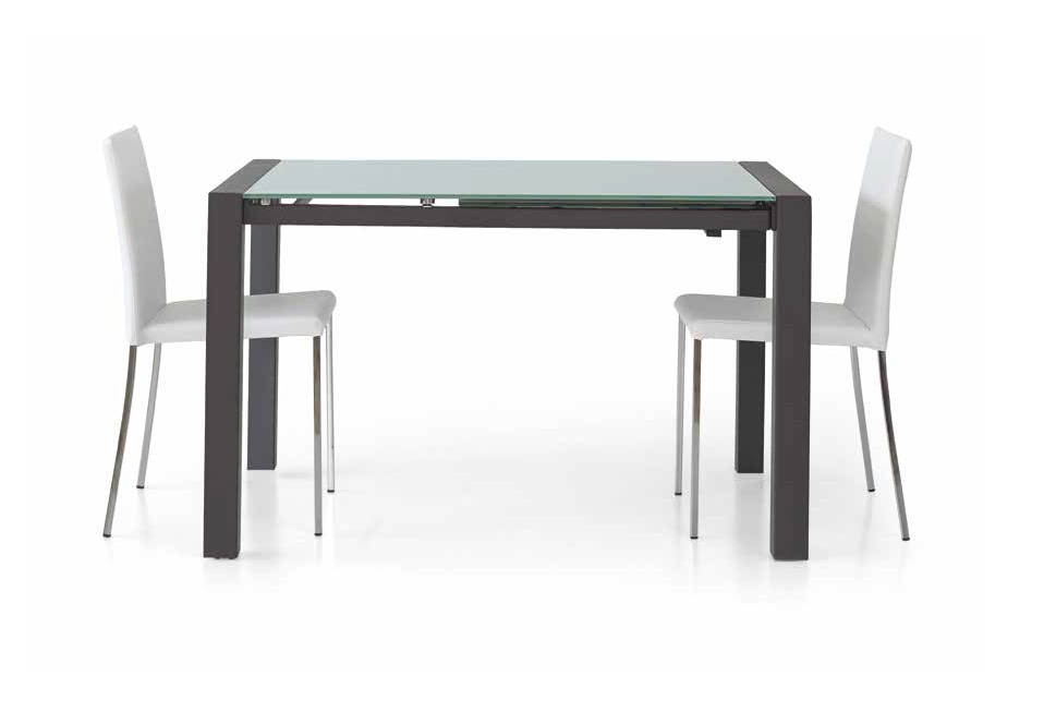 Tavolo allungabile in legno wenghe' con piano in vetro, apertura con binario