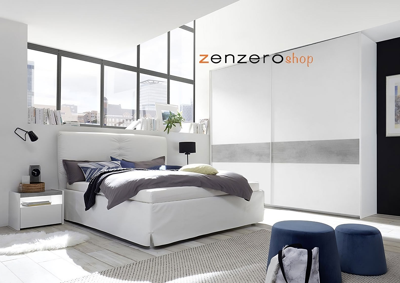 Camera matrimoniale con letto in ecopelle bianco, comodini bianchi opachi e armadio con fascia beton H.248