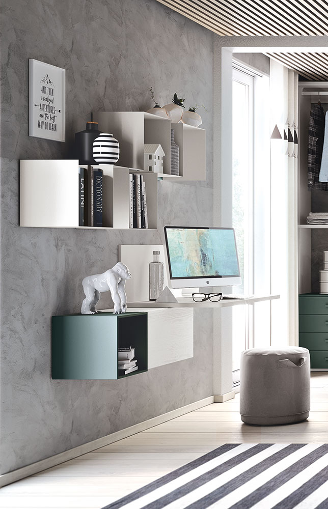 Zona studio con scrivania sospesa in finitura Bianco frassino e Blu reale