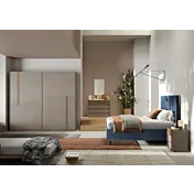 camera moderna con letto blu