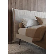 letto con testata rivestita