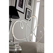 particolare letto in ferro, testiera