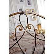 particolare pediera in finitura marrone anticato oro