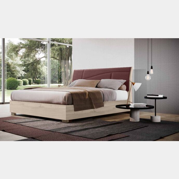 Letto con testata imbottita