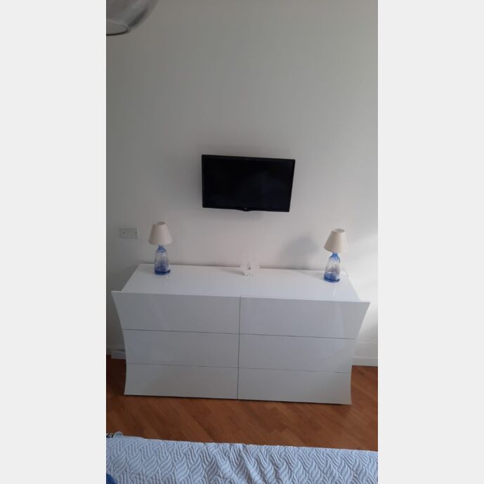 Comò linea arco con 6 cassetti grande in finitura bianco laccato lucido