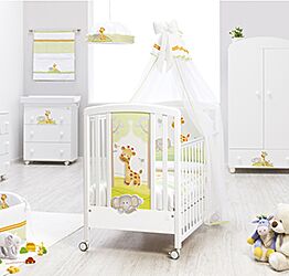 Culla neonati Melman bianca  con ruote e decori colorati