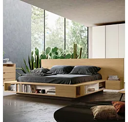 letto con librerie laterali