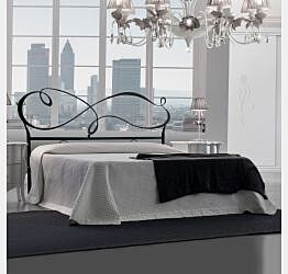 letto matrimoniale bianco con giroletto in ferro