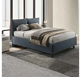 letto azzurro cuscini