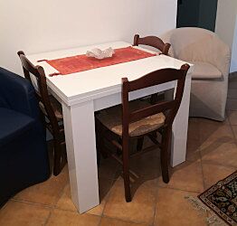 Tavolo quadrato apertura a libro, finitura Bianco Lucido