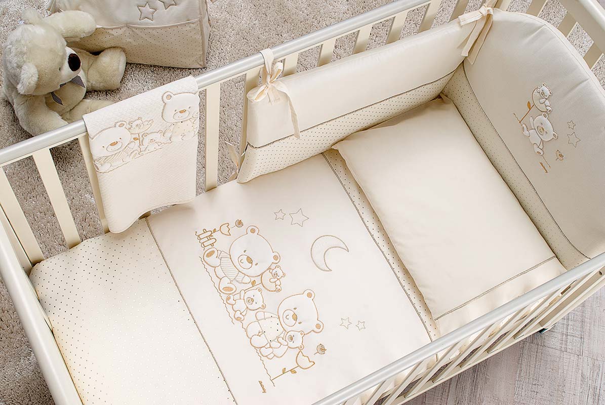 Lettino neonati Paddington avorio con decorazioni e ruote Zenzero Shop