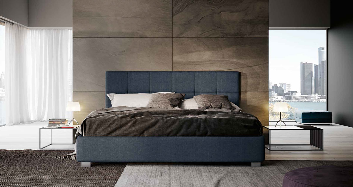 Letto matrimoniale imbottito blu notte, testata retrofinita
