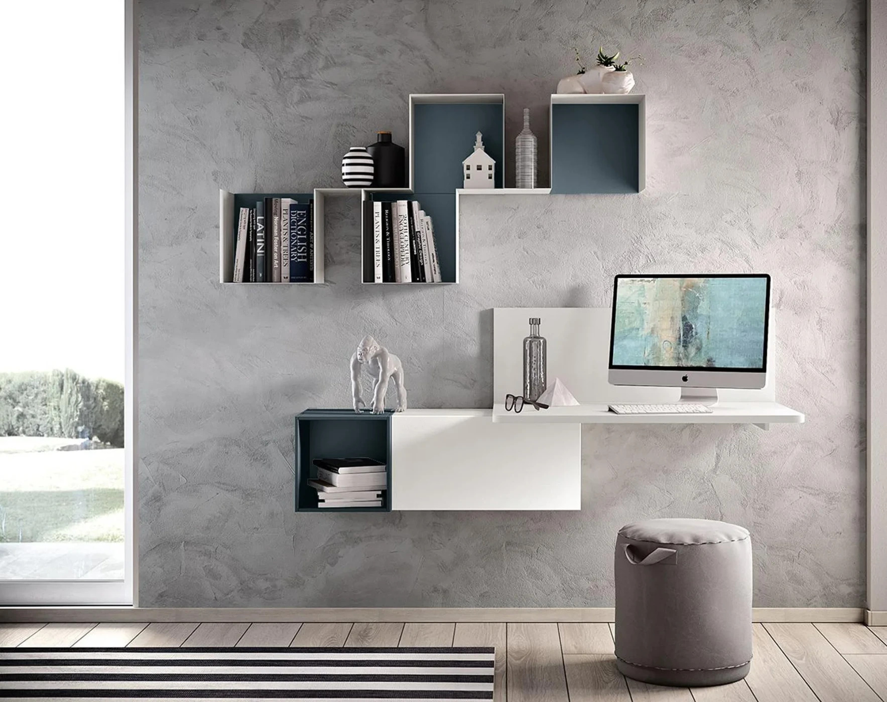 Zona studio con scrivania sospesa in finitura Bianco frassino e Blu reale